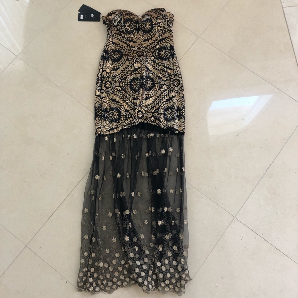 Black and gold sequin prom dress with sheer bottom
